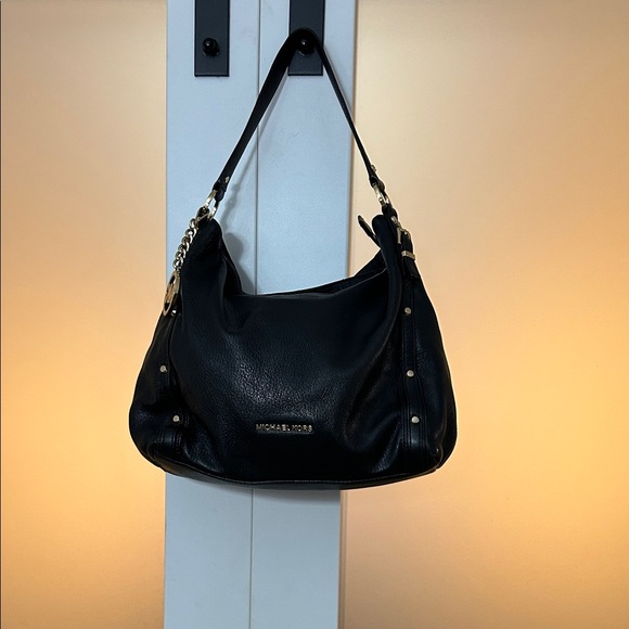 Michael Kors Black Hobo Bag with Gold Accents